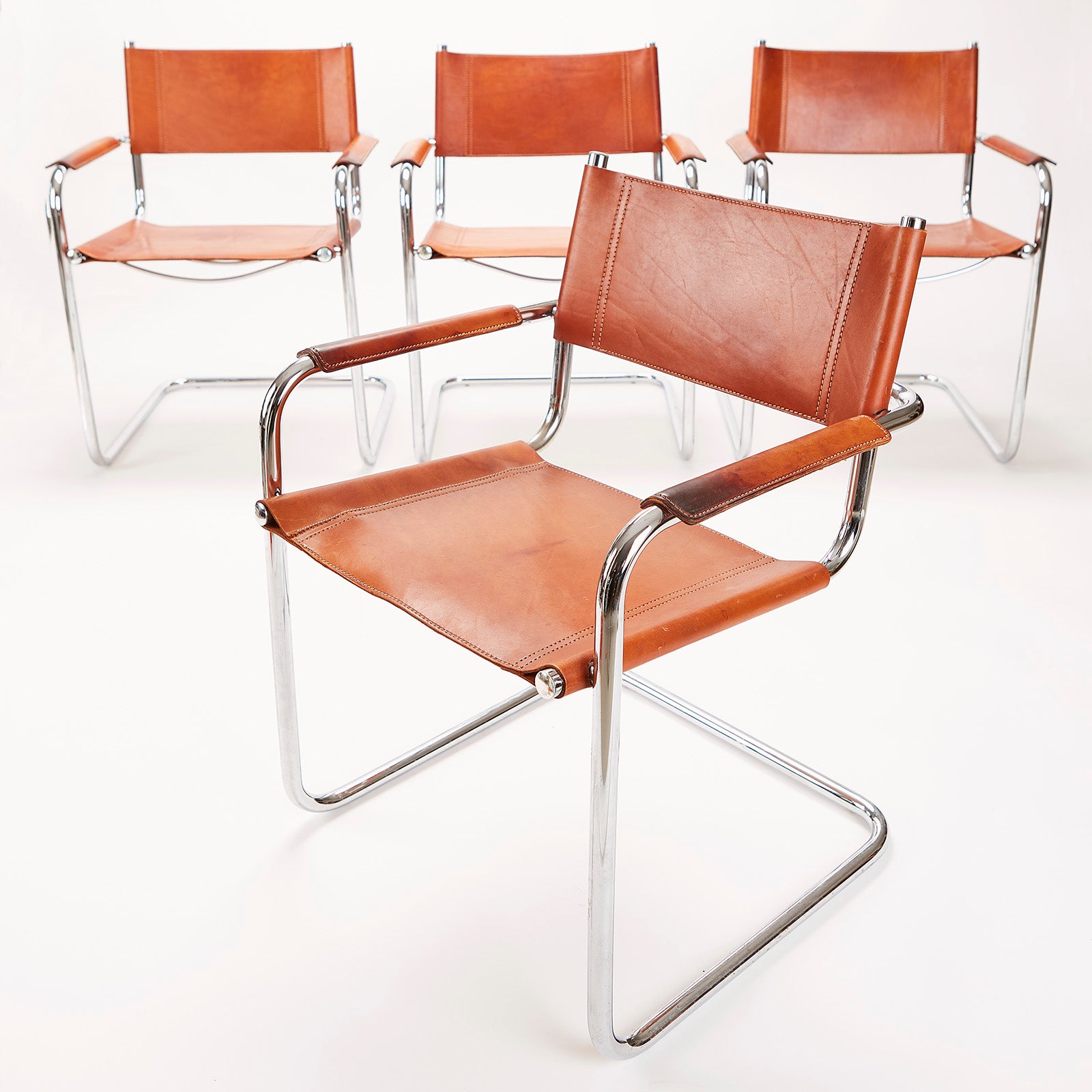 Set of 4 Leather and Chrome Cantilever Arm Chairs, by Loewenstein