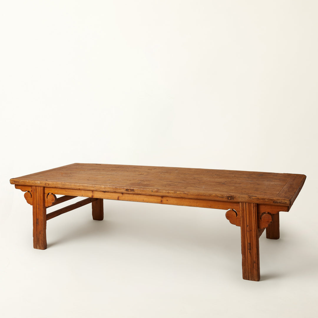 large low Wooden chinese table on a white background