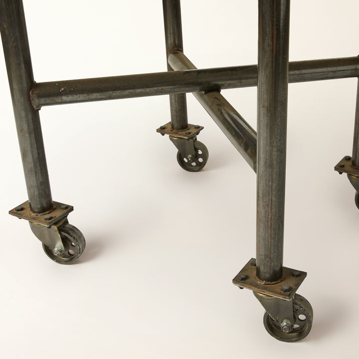Industrial Style Round Metal Table on Casters