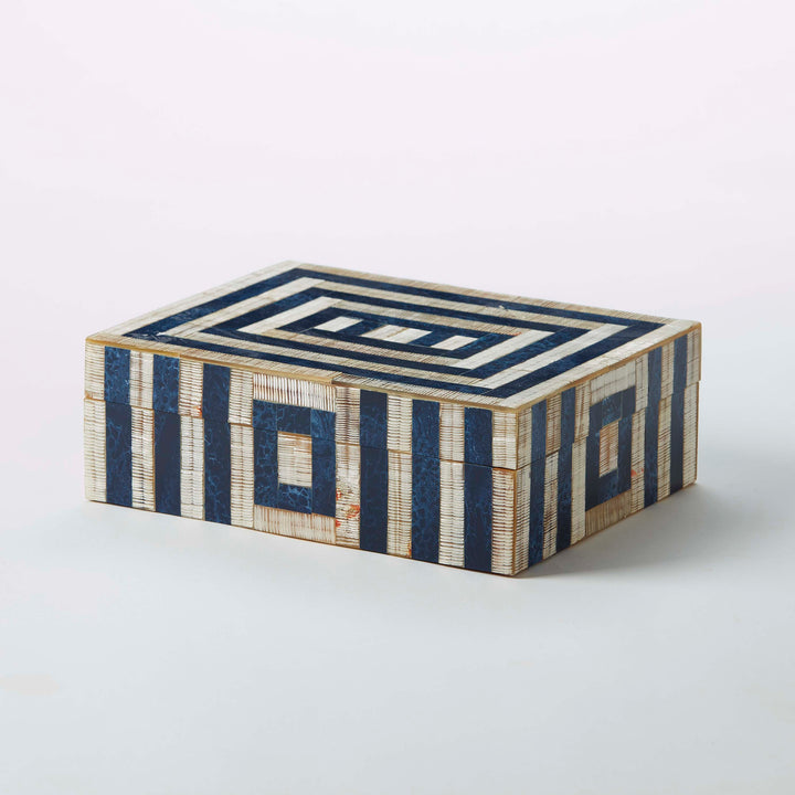 Decorative box with geometric pattern on a white background