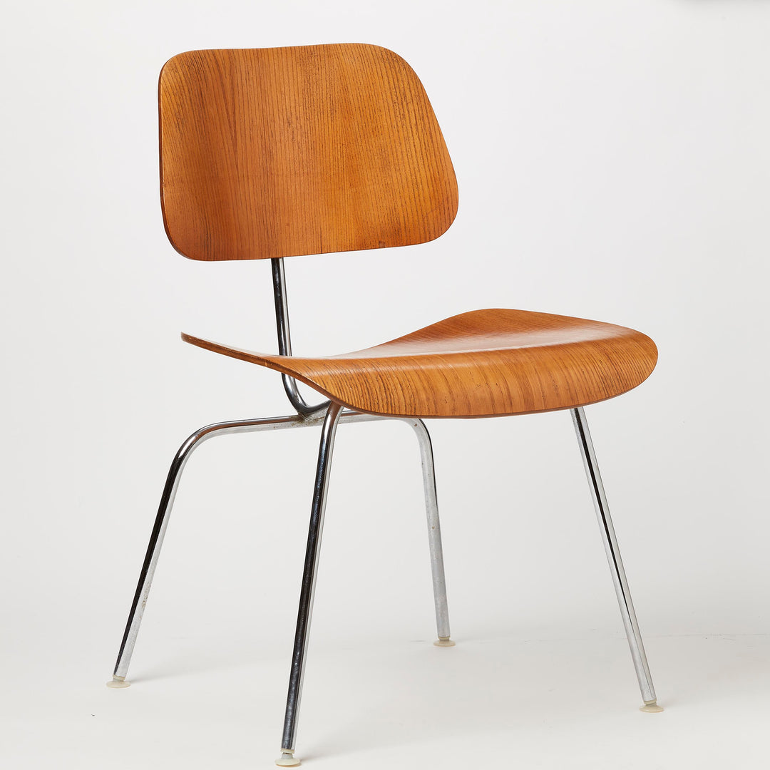 Wooden Eames chair with chrome legs