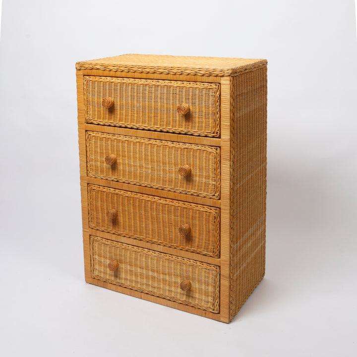 A four-drawer rattan/wicker chest of drawers in a natural light brown tone, featuring woven fronts, braided top and side trim, and round wooden knobs, 