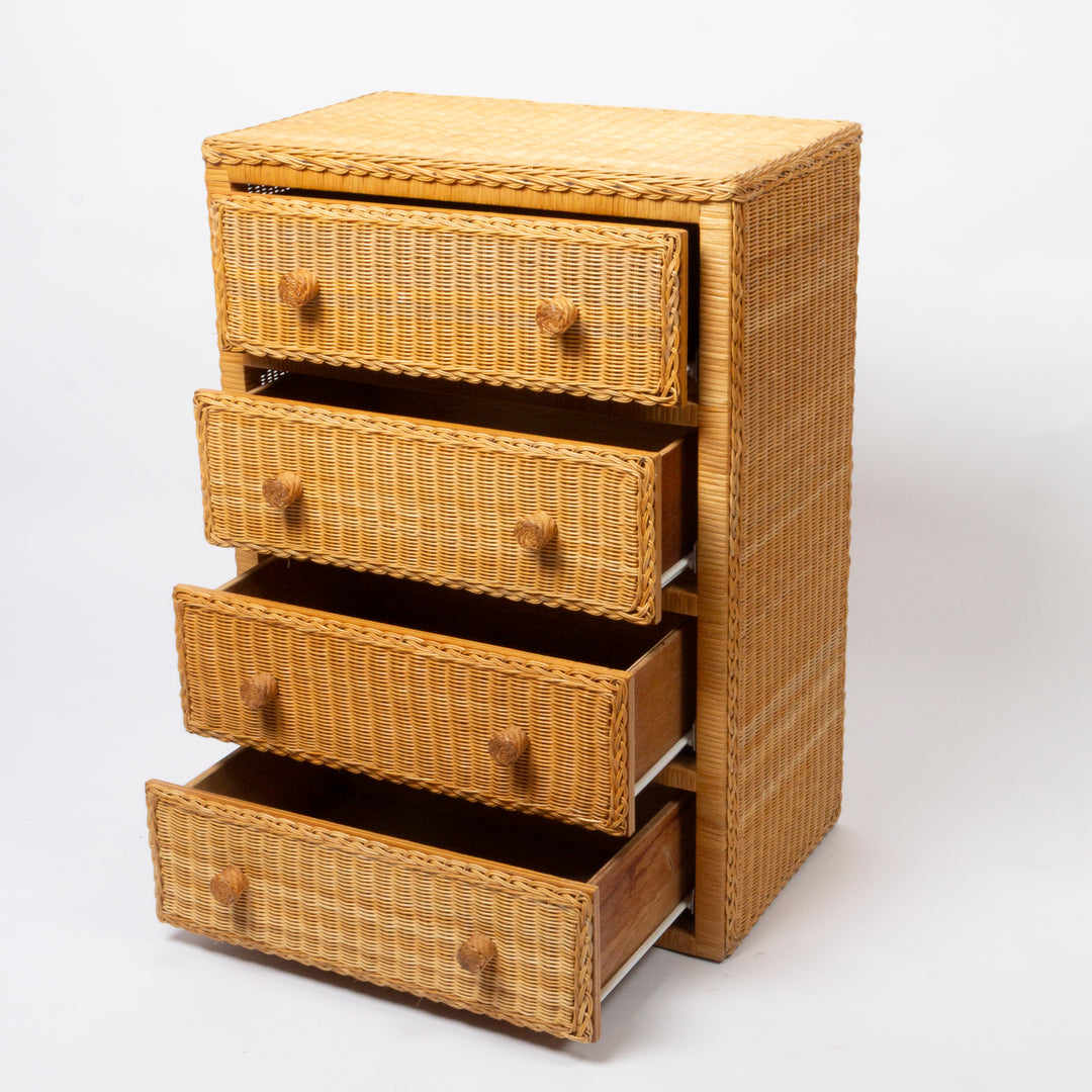 A five-drawer wooden chest with a woven rattan or wicker front and side panel, featuring round wooden knobs and open drawers, 