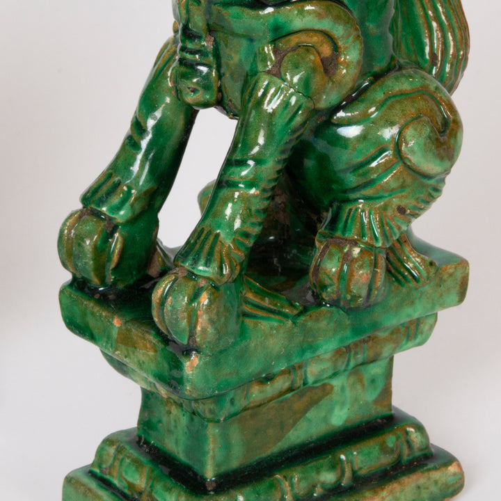 Pair of Vibrant Green-Glazed Pottery  Foo Dogs / Guardian Lions Circa 1900–1920, Chinese
