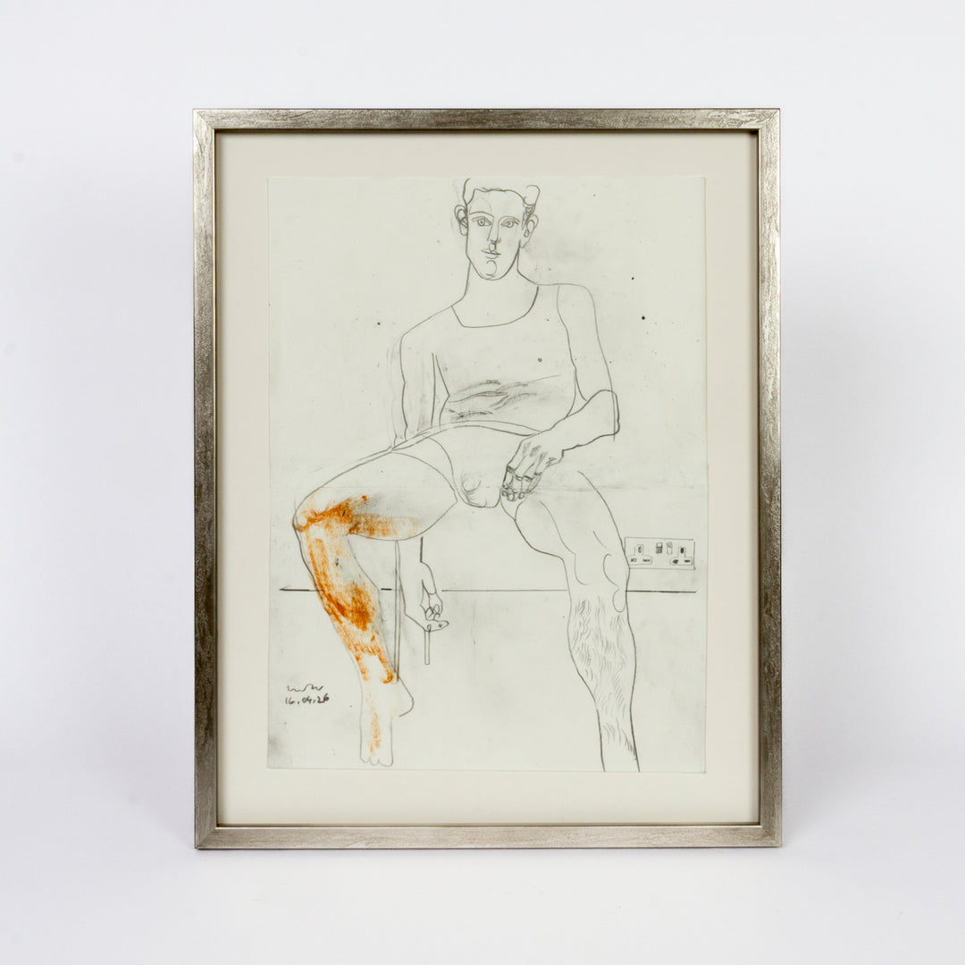 A framed art print featuring a minimalist pencil sketch of a seated nude figure with orange-brown painted accents on the legs, set in a light-colored wood frame against a white background.