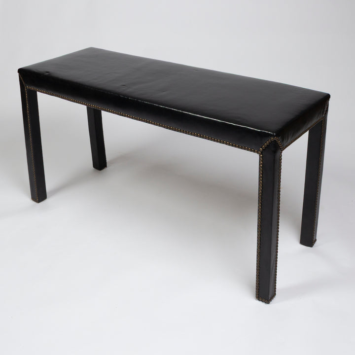 Leather covered table bench with nail head trim